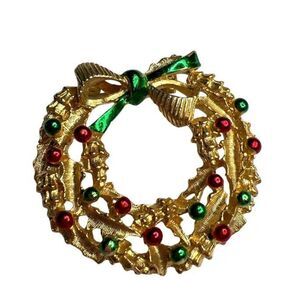 Gerry’s vintage gold tone enamel wreath brooch